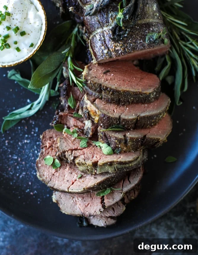 herb and butter roasted beef tenderloin I howsweeteats.com #beef #tenderloin #christmas #holidays #filet