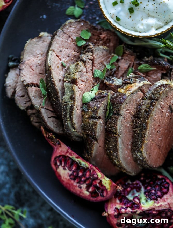 herb and butter roasted beef tenderloin I howsweeteats.com #beef #tenderloin #christmas #holidays #filet