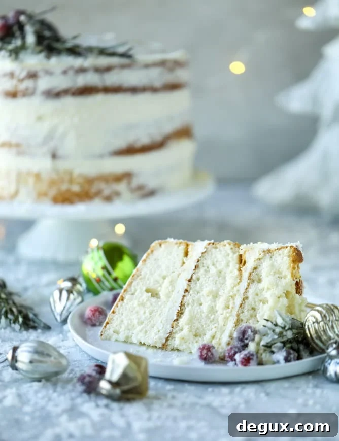 White Christmas Sparkle Cake Recipe for a Festive Holiday Dessert 11 white christmas sparkle cake I howsweeteats.com #christmas #cake #vanilla #almond