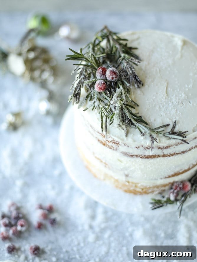 Winter White Sparkle Cake: Festive Snowflake Dessert Recipe 5 white christmas sparkle cake I howsweeteats.com #christmas #cake #vanilla #almond
