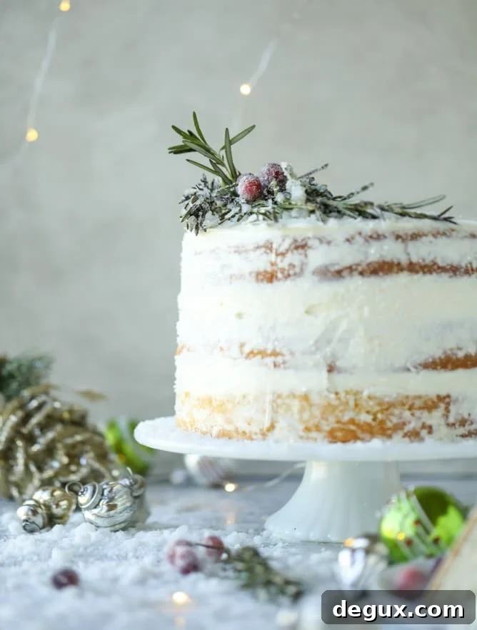 White Christmas Sparkle Cake Recipe for a Festive Holiday Dessert 8 white christmas sparkle cake I howsweeteats.com #christmas #cake #vanilla #almond