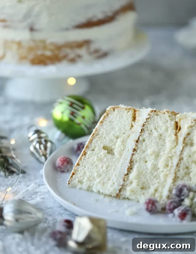 White Christmas Sparkle Cake Recipe for a Festive Holiday Dessert 9 white christmas sparkle cake I howsweeteats.com #christmas #cake #vanilla #almond