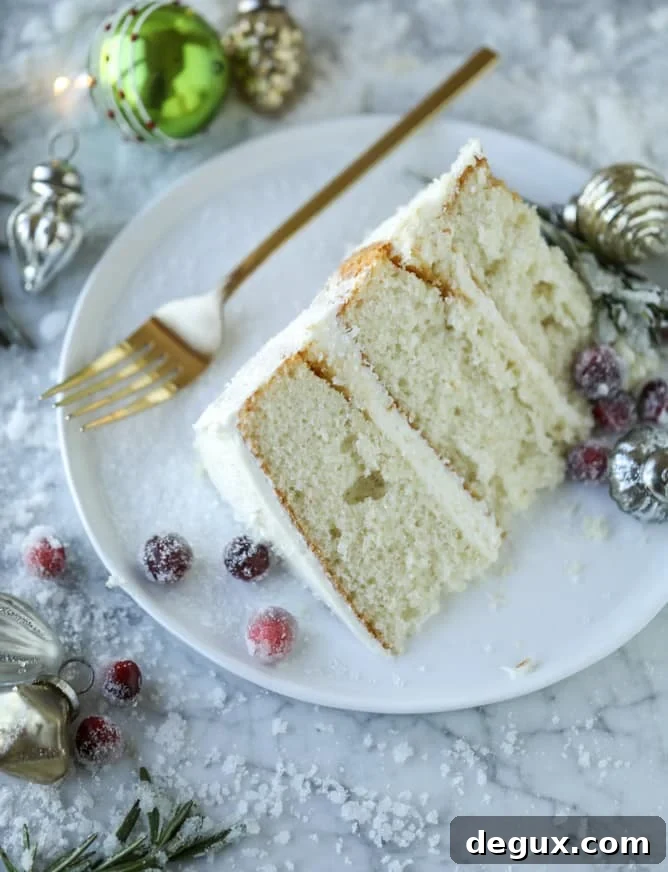White Christmas Sparkle Cake Recipe for a Festive Holiday Dessert 10 white christmas sparkle cake I howsweeteats.com #christmas #cake #vanilla #almond