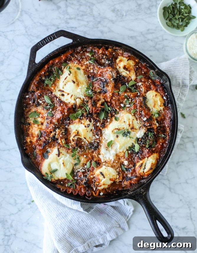 spicy sausage and kale skillet lasagna I howsweeteats.com #sausage #kale #skillet #lasagna #pasta