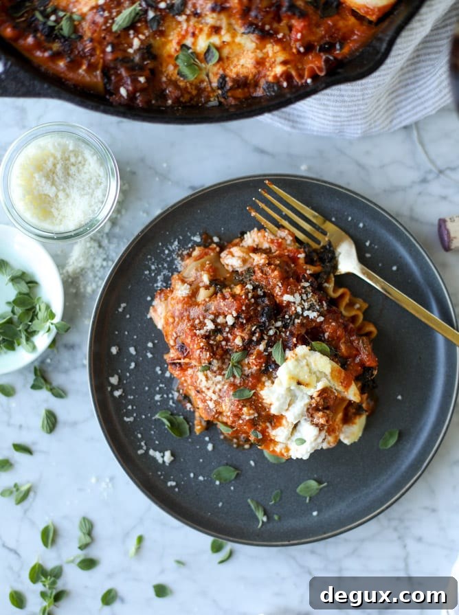 spicy sausage and kale skillet lasagna I howsweeteats.com #sausage #kale #skillet #lasagna #pasta