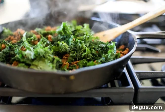 spicy sausage and kale skillet lasagna I howsweeteats.com #sausage #kale #skillet #lasagna #pasta