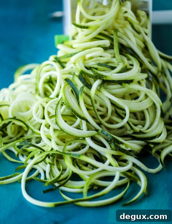 thai chicken zoodle soup I howsweeteats.com #chicken #soup #zoodles #zucchininoodles #coconutmilk 