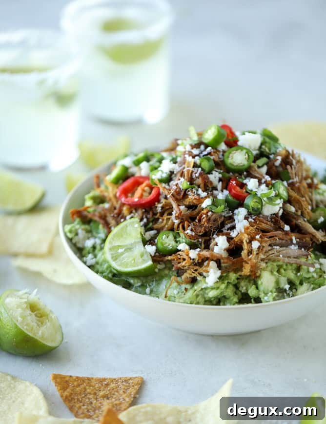 Crispy Carnitas with Creamy Guacamole Bowl 2 crispy carnitas guacamole I howsweeteats.com #guacamole #dip #avocado