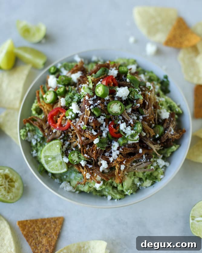 Crispy Carnitas with Creamy Guacamole Bowl 8 crispy carnitas guacamole I howsweeteats.com #guacamole #dip #avocado