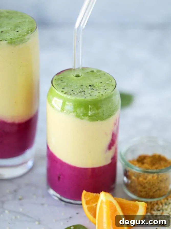 layered immunity boosting smoothie I howsweeteats.com #healthy #recipes #smoothie #immunityboosting