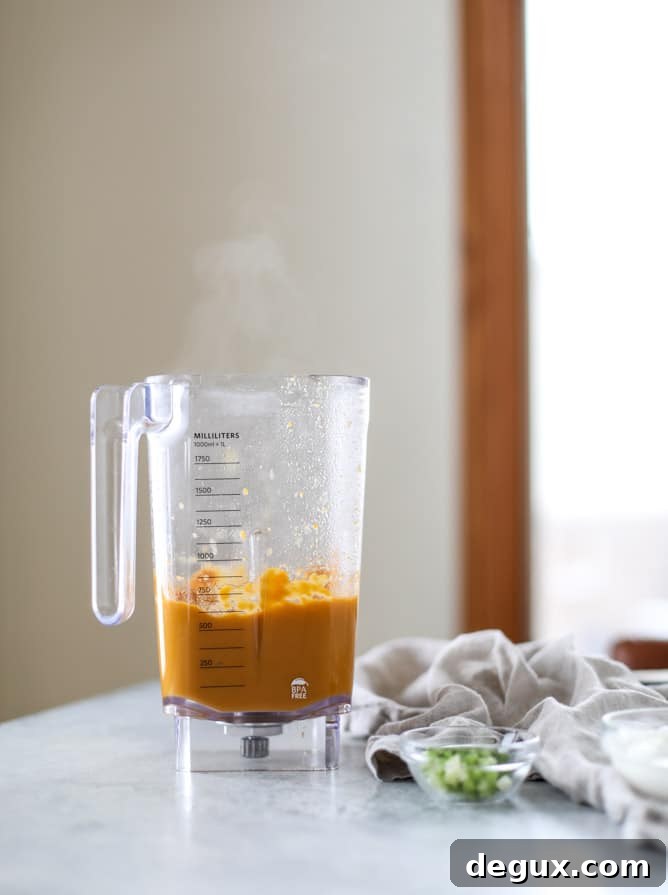 silky ginger sweet potato soup I howsweeteats.com #soup #sweetpotatoes #ginger #vegan