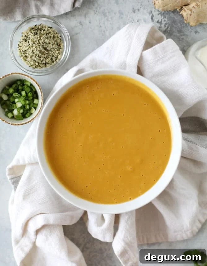 silky ginger sweet potato soup I howsweeteats.com #soup #sweetpotatoes #ginger #vegan
