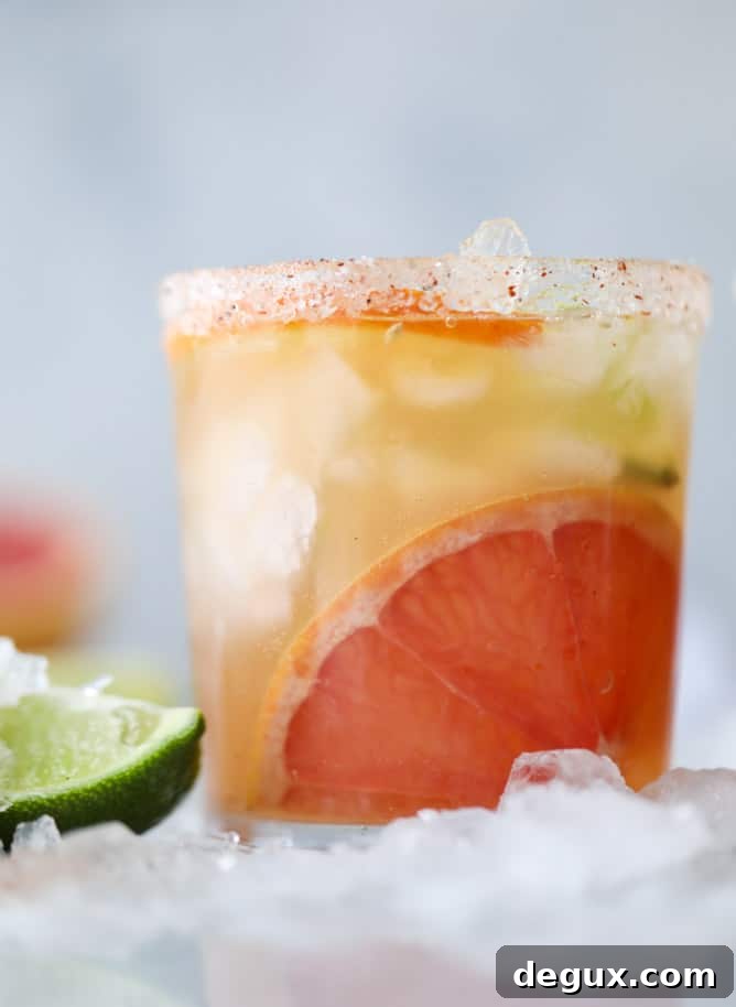 Triple Citrus Kombucha Fizz with Salty Chili Sugar Rim 5 kombucha mocktail - triple citrus kombucha fizz
