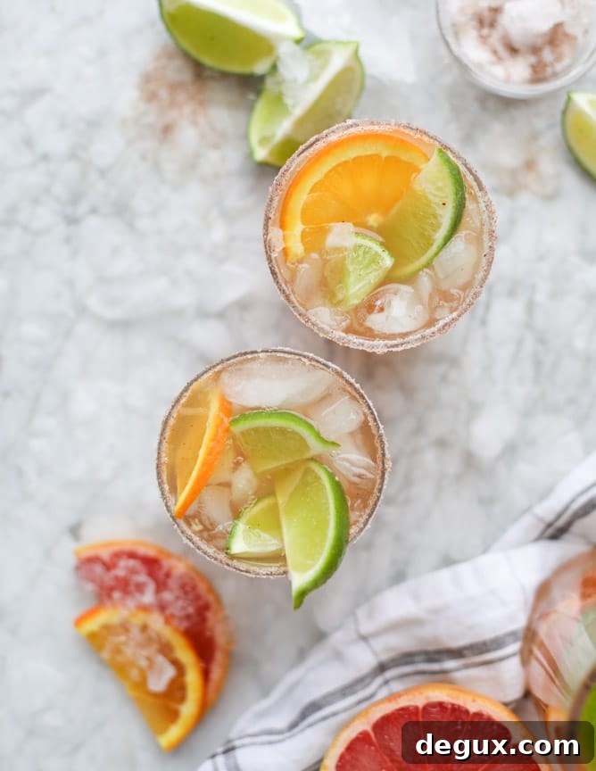 Triple Citrus Kombucha Fizz with Salty Chili Sugar Rim 7 kombucha mocktail - triple citrus kombucha fizz