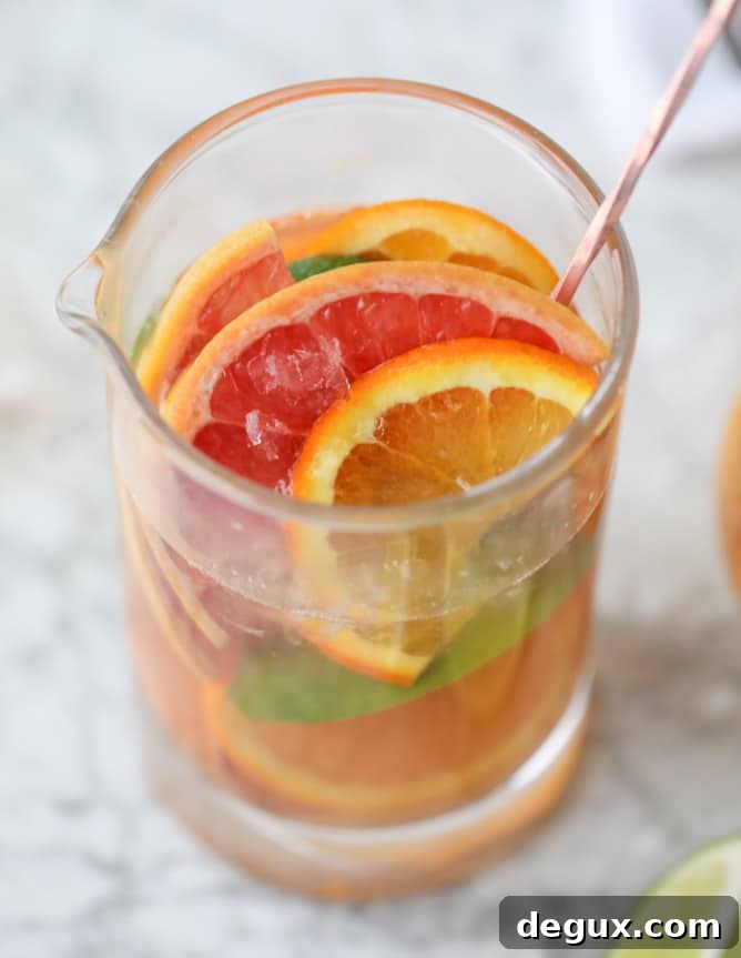 Triple Citrus Kombucha Fizz with Salty Chili Sugar Rim 9 kombucha mocktail - triple citrus kombucha fizz