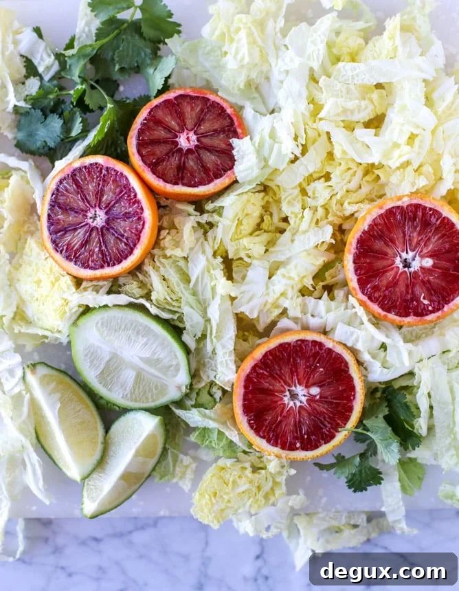 Cajun Fish Tacos with Zesty Blood Orange Slaw 3 cajun fish tacos with blood orange slaw I howsweeteats.com #fishtacos #tacos #bloodorange #fish