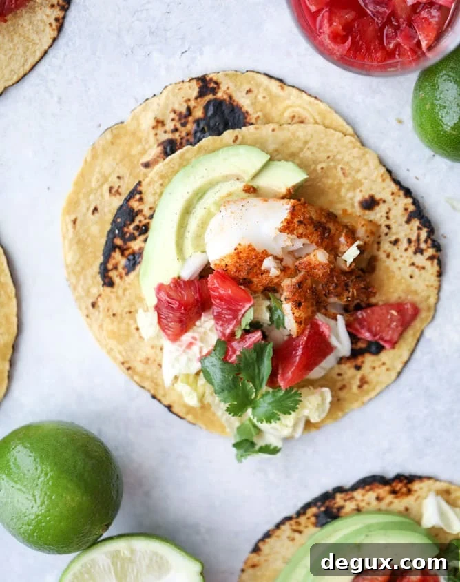 Cajun Fish Tacos with Zesty Blood Orange Slaw 7 cajun fish tacos with blood orange slaw I howsweeteats.com #fishtacos #tacos #bloodorange #fish