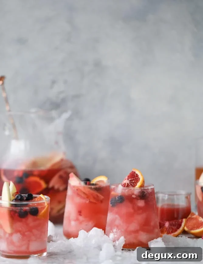 Kombucha Sangria Recipe: Sparkling Fruit Punch with Probiotic Twist 6 kombucha sangria I howsweeteats.com #kombucha #sangria #cocktails