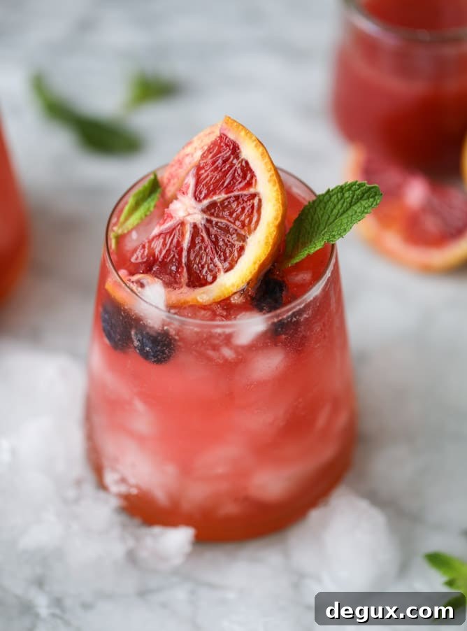 Kombucha Sangria Recipe: Sparkling Fruit Punch with Probiotic Twist 7 kombucha sangria I howsweeteats.com #kombucha #sangria #cocktails