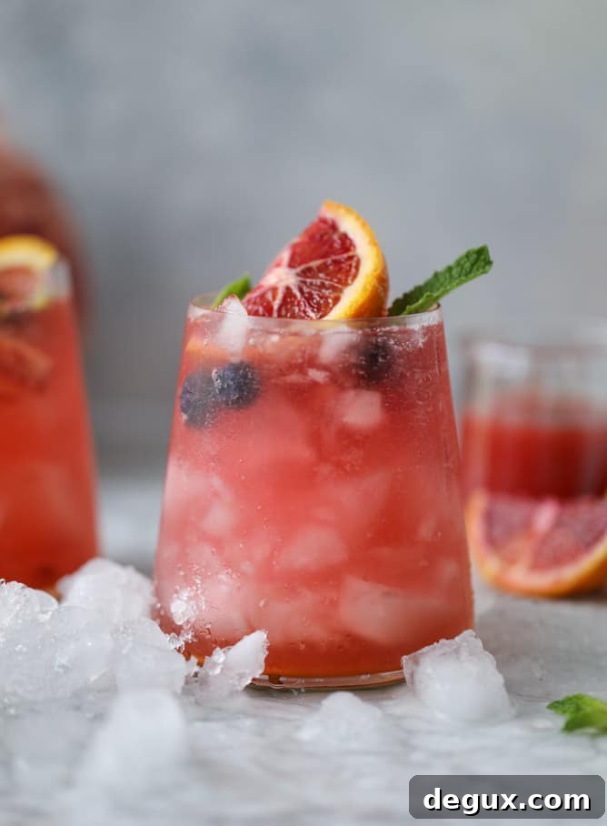 Kombucha Sangria Recipe: Sparkling Fruit Punch with Probiotic Twist 9 kombucha sangria I howsweeteats.com #kombucha #sangria #cocktails