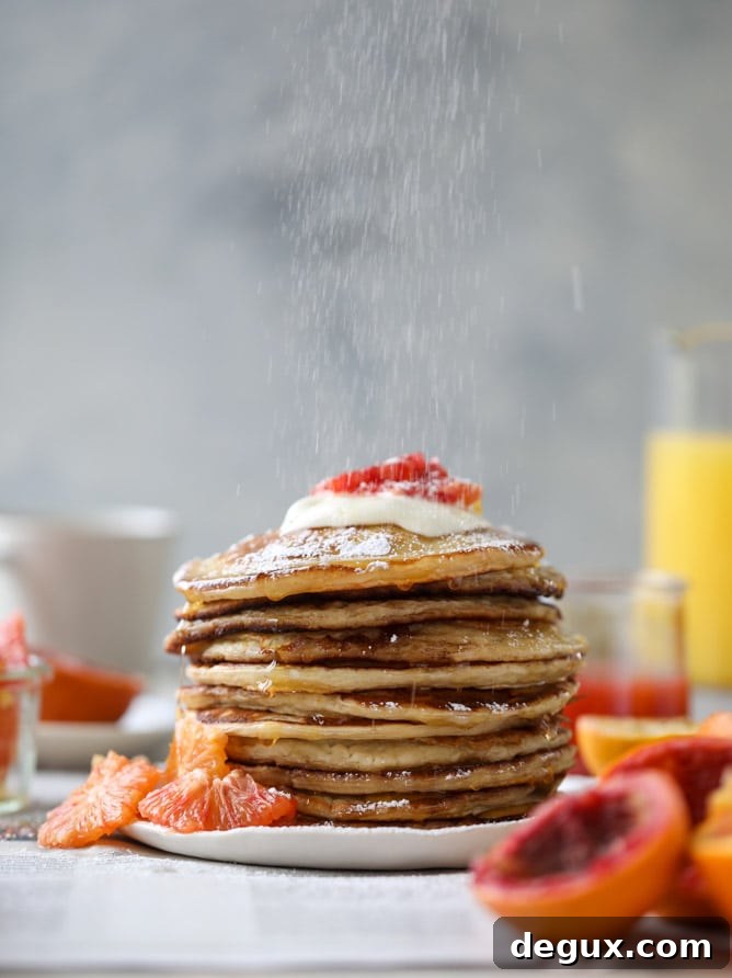 Fluffy Greek Yogurt Pancakes with Warm Winter Citrus Compote 2 greek yogurt pancakes with warm winter citrus I howsweeteats.com #greekyogurt #pancakes #breakfast #brunch #citrus