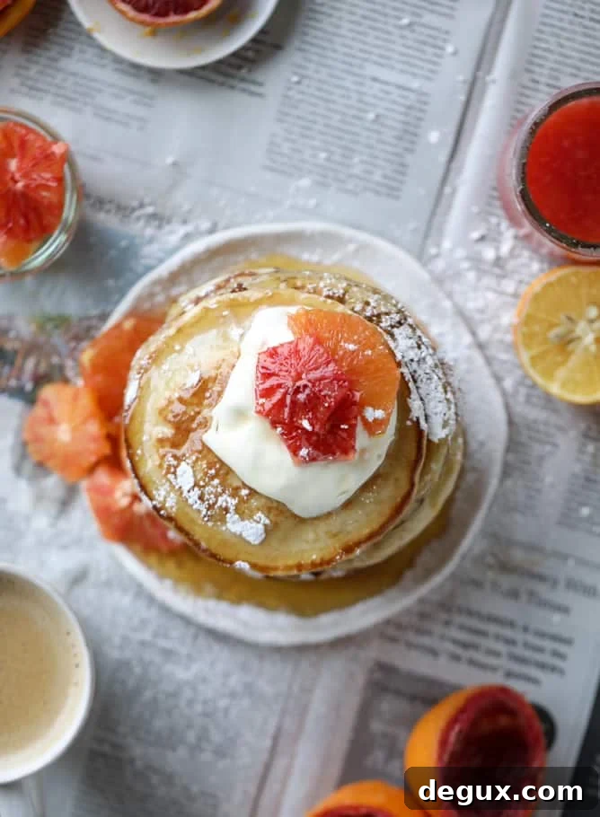 Fluffy Greek Yogurt Pancakes with Warm Winter Citrus Compote 10 greek yogurt pancakes with warm winter citrus I howsweeteats.com #greekyogurt #pancakes #breakfast #brunch #citrus