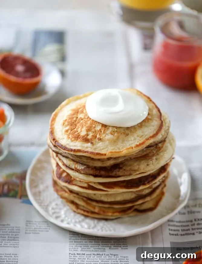 Fluffy Greek Yogurt Pancakes with Warm Winter Citrus Compote 6 greek yogurt pancakes with warm winter citrus I howsweeteats.com #greekyogurt #pancakes #breakfast #brunch #citrus