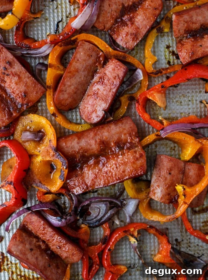 Smoky Sheet Pan Sausage and Peppers Recipe 4 sheet pan smoked sausage and peppers I howsweeteats.com #sheetpan #smoked #sausage #turkey #healthy
