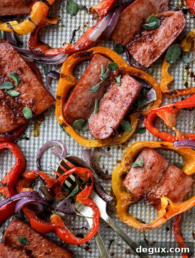 Smoky Sheet Pan Sausage and Peppers Recipe 7 sheet pan smoked sausage and peppers I howsweeteats.com #sheetpan #smoked #sausage #turkey #healthy