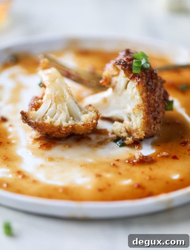 Sweet-Spiced Roasted Cauliflower with Honey and Chili 9 sweet and spicy roasted cauliflower I howsweeteats.com #cauliflower #crispy #roasted #sweet #spicy