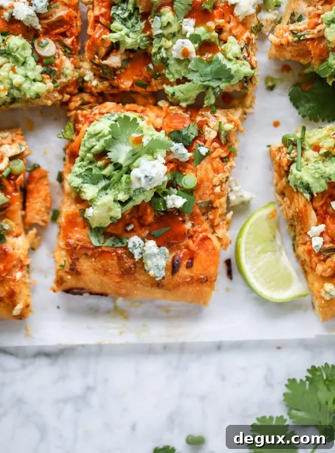 guacamole buffalo chicken pizza I howsweeteats.com #buffalochicken #pizza #guacamole #buffalowing