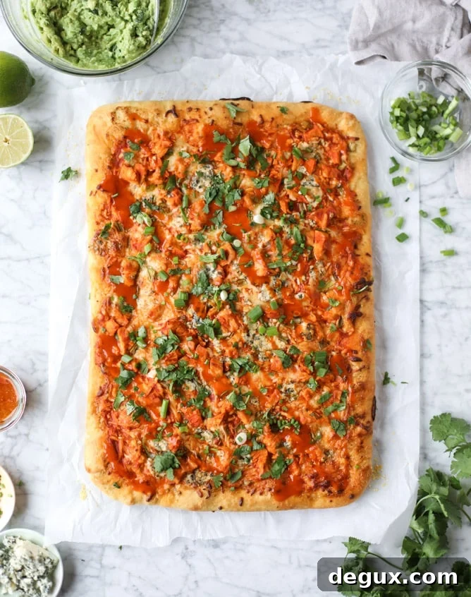 guacamole buffalo chicken pizza I howsweeteats.com #buffalochicken #pizza #guacamole #buffalowing