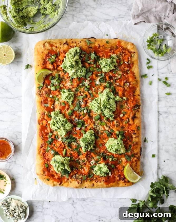 guacamole buffalo chicken pizza I howsweeteats.com #buffalochicken #pizza #guacamole #buffalowing
