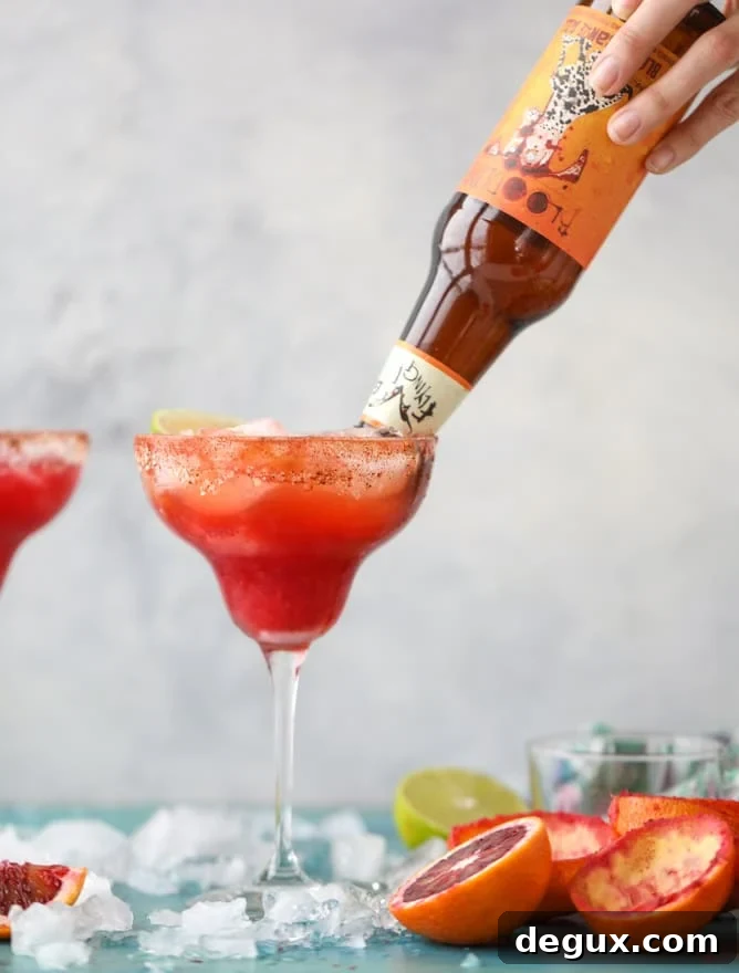 spicy blood orange beergaritas I howsweeteats.com #beer #margaritas #beergaritas #cocktails #bloodorange