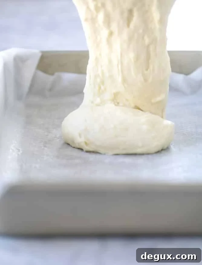 Lemon Sheet Cake with Cream Cheese Frosting Recipe 4 lemon sheet cake with cream cheese frosting I howsweeteats.com #lemon #cake #sheetcake #dessert #creamcheesefrosting