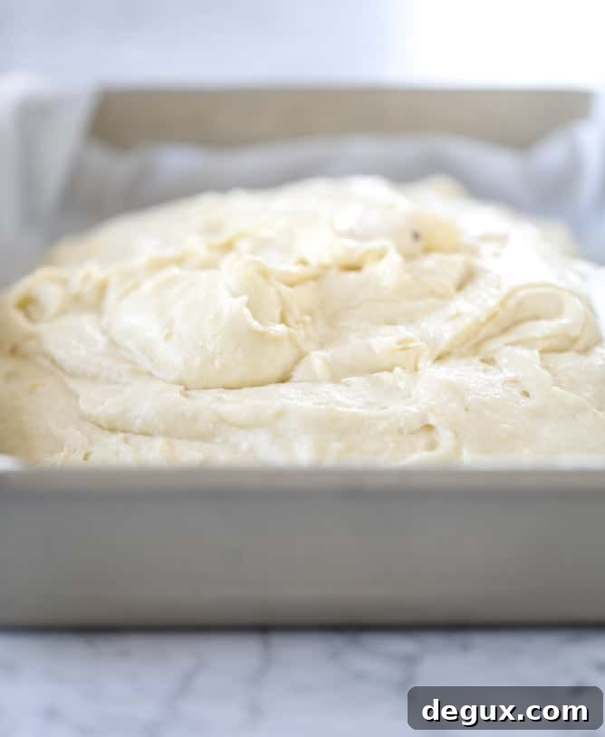 Lemon Sheet Cake with Cream Cheese Frosting Recipe 5 lemon sheet cake with cream cheese frosting I howsweeteats.com #lemon #cake #sheetcake #dessert #creamcheesefrosting
