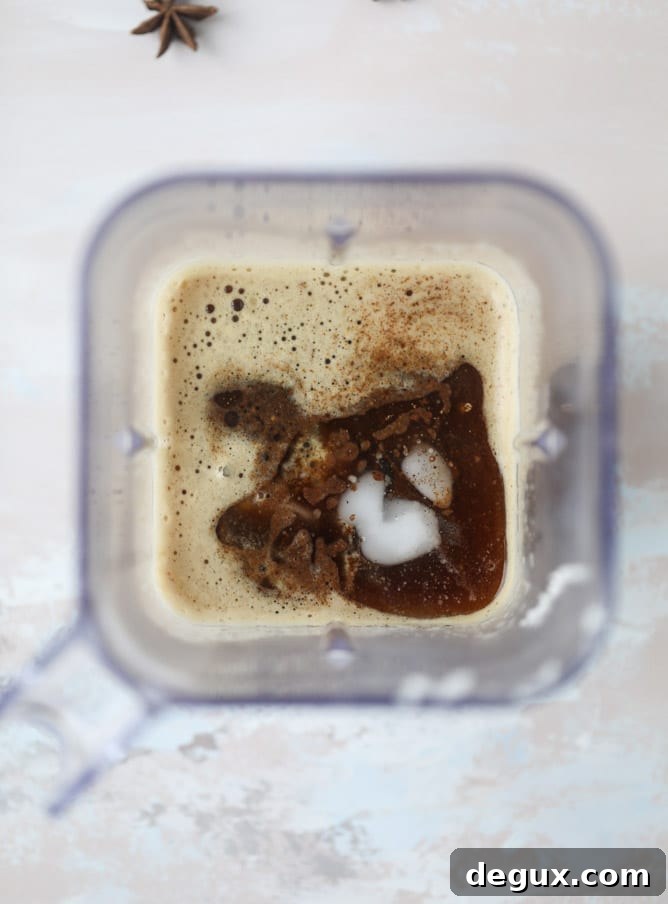 Coconut Chai Power Coffee: Energizing Spiced Coconut Latte Recipe 3 coconut chai power coffee I howsweeteats.com #coffee #coconut #chai #bulletproof #coconutoil