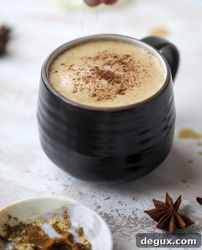Coconut Chai Power Coffee: Energizing Spiced Coconut Latte Recipe 5 coconut chai power coffee I howsweeteats.com #coffee #coconut #chai #bulletproof #coconutoil