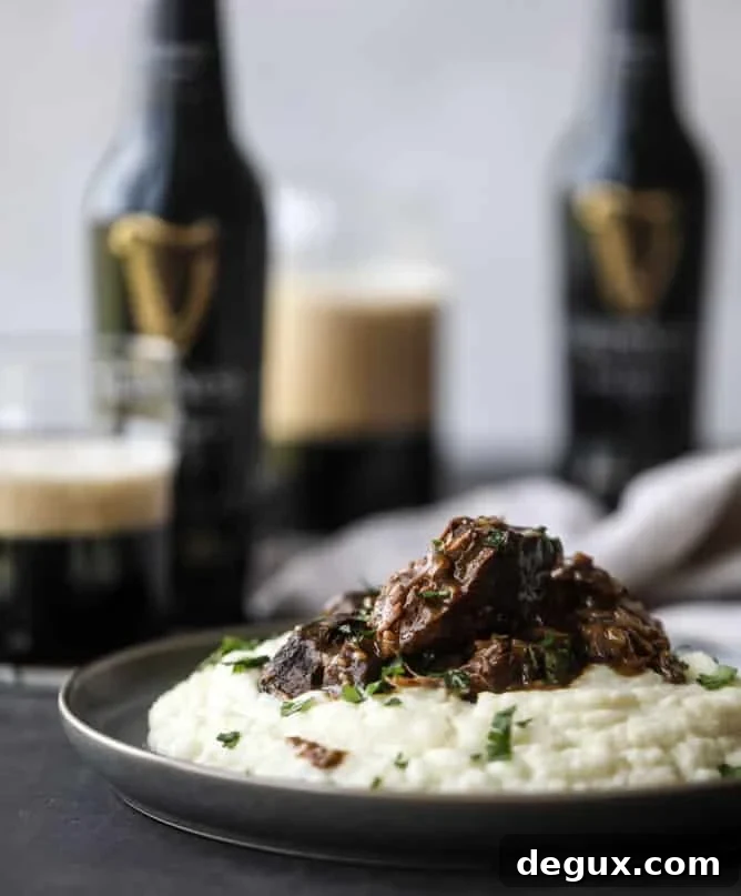 Guinness-Braised Short Ribs with Cheesy Cauliflower Mash 6 guinness short ribs with cheesy cauliflower mash I howsweeteats.com #slowcooker #guinness #shortribs #saintpatricksday #cauliflower