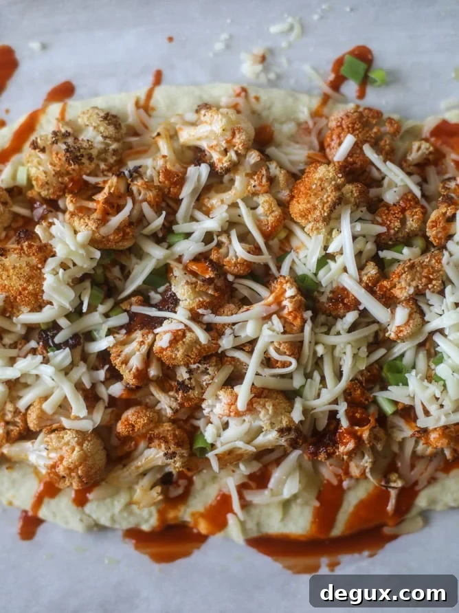roasted buffalo cauliflower flatbread I howsweeteats.com #cauliflower #buffalo #pizza #flatbread