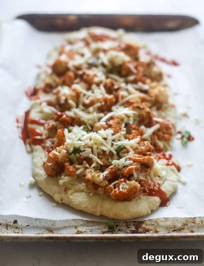roasted buffalo cauliflower flatbread I howsweeteats.com #cauliflower #buffalo #pizza #flatbread