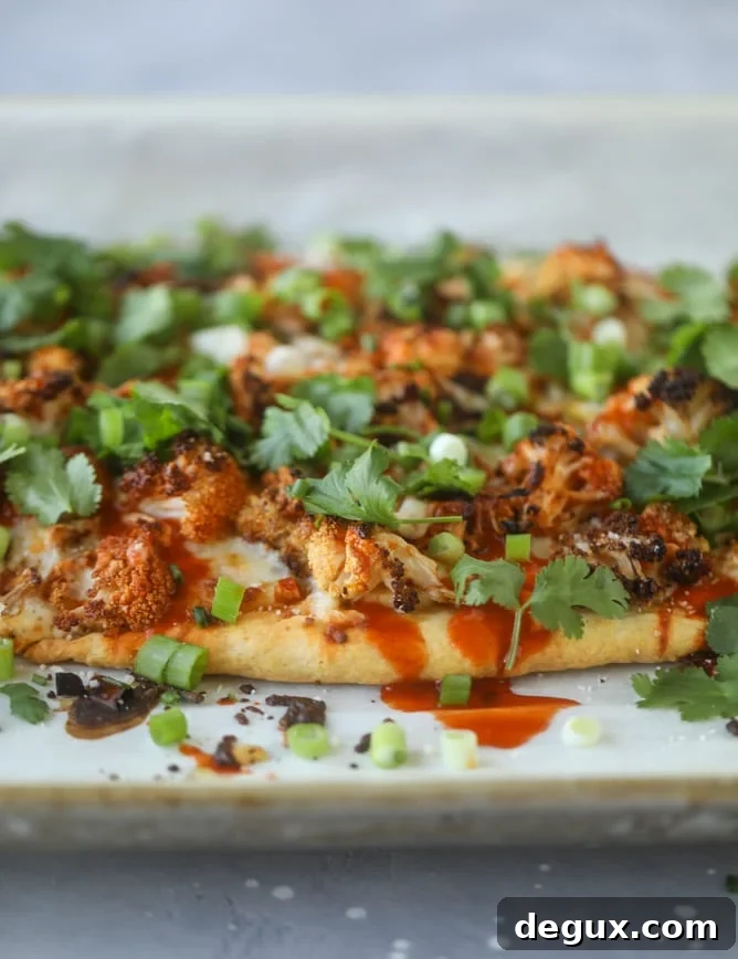 roasted buffalo cauliflower flatbread I howsweeteats.com #cauliflower #buffalo #pizza #flatbread