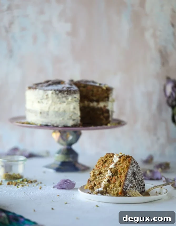 Pistachio Carrot Cake with Cream Cheese Frosting Recipe 2 pistachio carrot cake with cream cheese frosting I howsweeteats.com #carrotcake #pistachio #cake #creamcheese #frosting