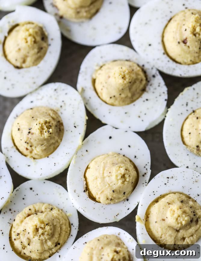 french onion deviled eggs I howsweeteats.com #deviledeggs #frenchonion #easter #egg #recipes