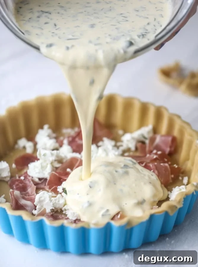 prosciutto, herb & goat cheese quiche I howsweeteats.com #quiche #goatcheese #brunch #prosciutto #breakfast