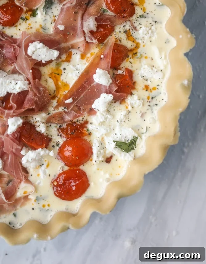 Burst Cherry Tomato, Prosciutto & Goat Cheese Quiche Recipe 8 prosciutto, herb & goat cheese quiche I howsweeteats.com #quiche #goatcheese #brunch #prosciutto #breakfast