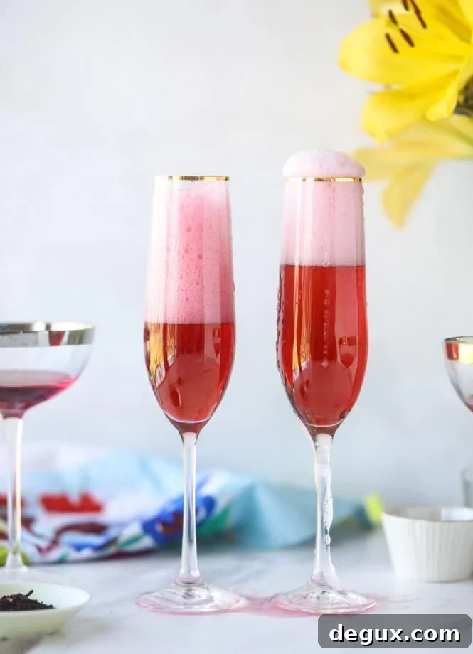Sparkling Rosé Hibiscus Mimosa Recipe for Brunch 2 rosé hibiscus mimosas I howsweeteats.com #champagne #mimosa #rose #hibiscus #cocktail