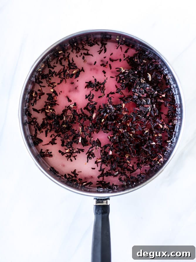 Sparkling Rosé Hibiscus Mimosa Recipe for Brunch 4 rosé hibiscus mimosas I howsweeteats.com #champagne #mimosa #rose #hibiscus #cocktail
