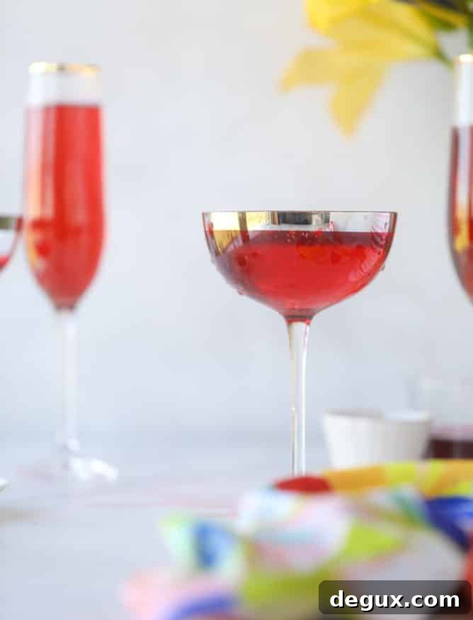 Sparkling Rosé Hibiscus Mimosa Recipe for Brunch 8 rosé hibiscus mimosas I howsweeteats.com #champagne #mimosa #rose #hibiscus #cocktail