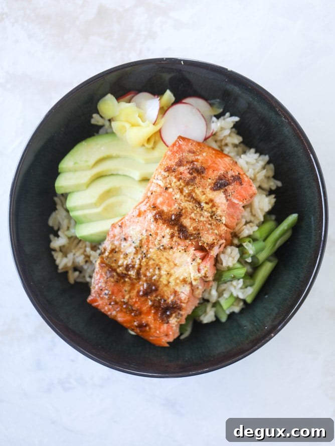butter salmon rice bowls I howsweeteats.com #salmon #rice #bowls #seafood #healthy